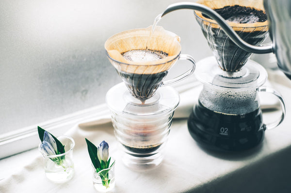 Pouring hot water into a Hario V60 Permeable Coffee Dripper 01