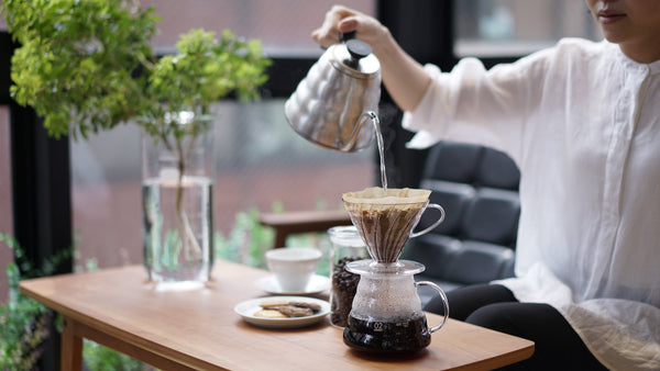 Pouring hot water into a Hario V60 Permeable Coffee Dripper 02